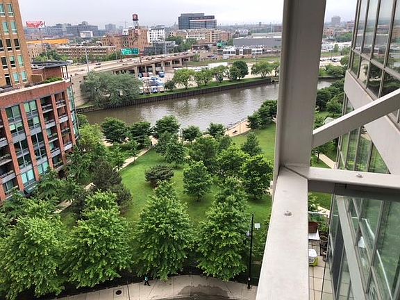Private balcony overlooks city, river and Ward Park.