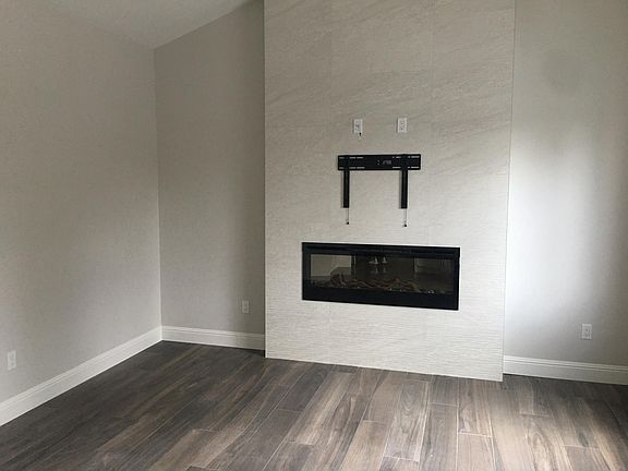 Showing electric fireplace and tv wall mount