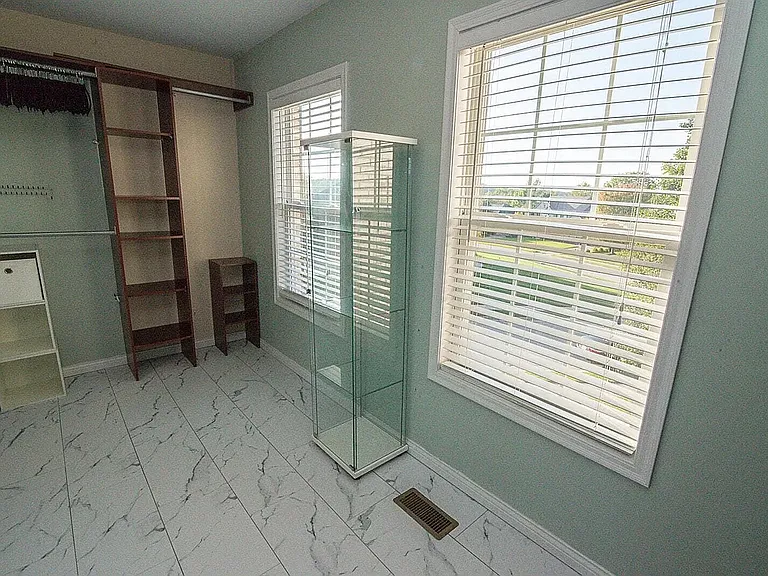 Walk in master closet with his and hers areas (will be repainted)