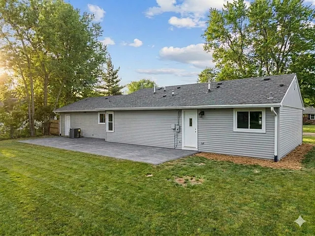 Great back yard with expansive concrete patio