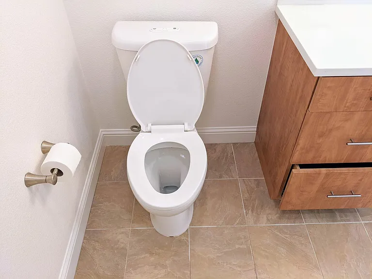 Water-saving toilet attached with master bedroom.