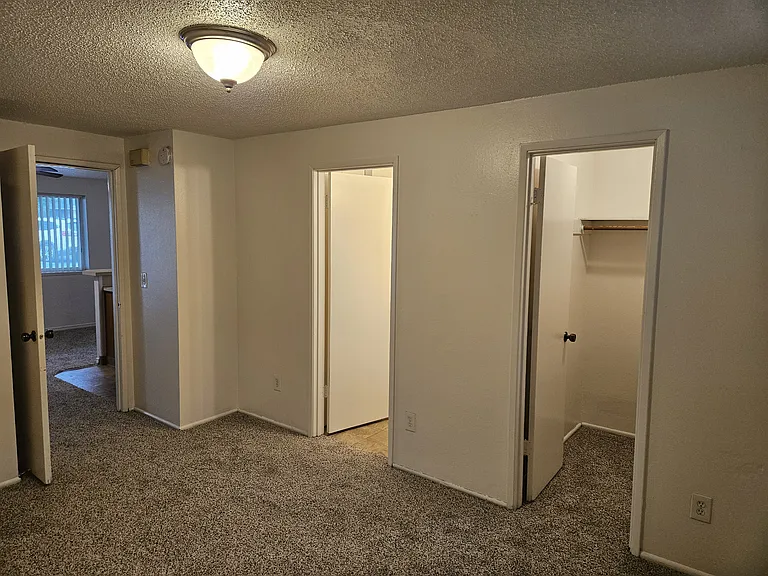 bedroom view to bath/closet/living in 1 bedroom apt.