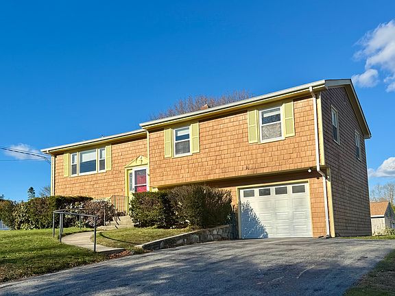 Front of the house with one car garage