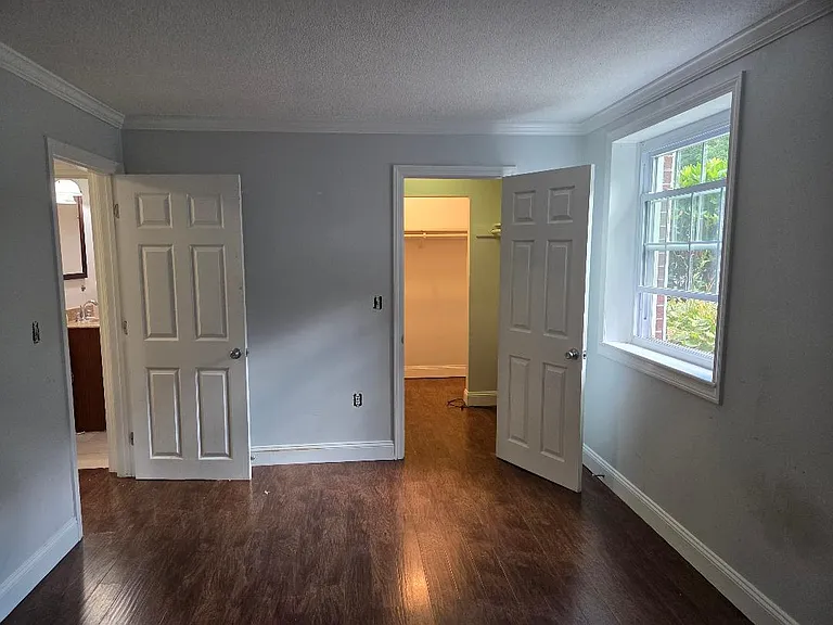 Bedroom with walk in closet