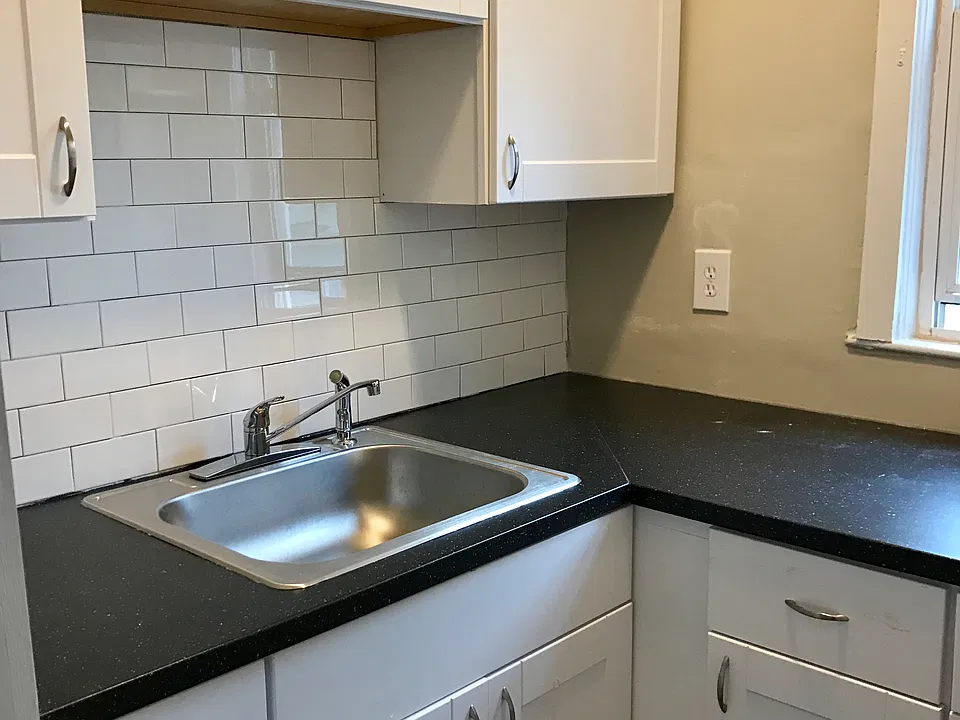 Separate pantry has sink and lots of storage