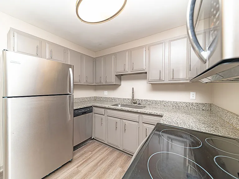 Kitchen with granite counters and stainless appliances