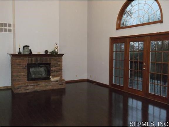 brick fireplace in living room