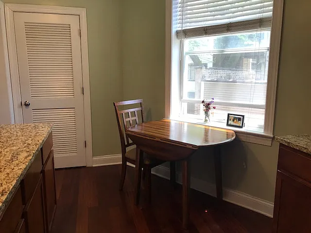Breakfast nook with southern exposure. Behind is a laundry closet door