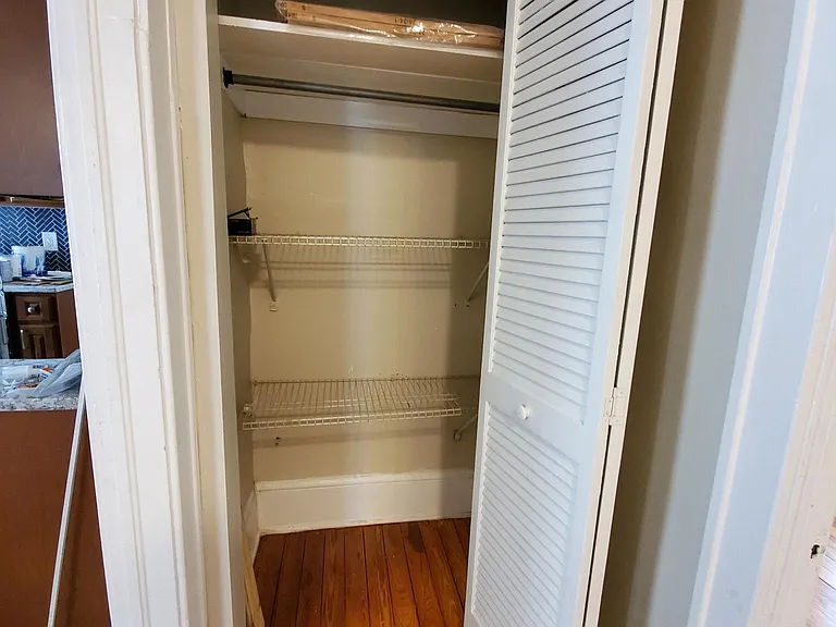 Ample storage in hallway closet