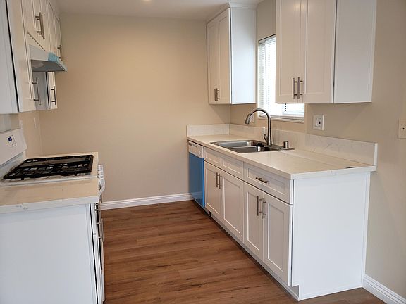 All new Kitchen with shaker cabinets and Caesar stone counter top.