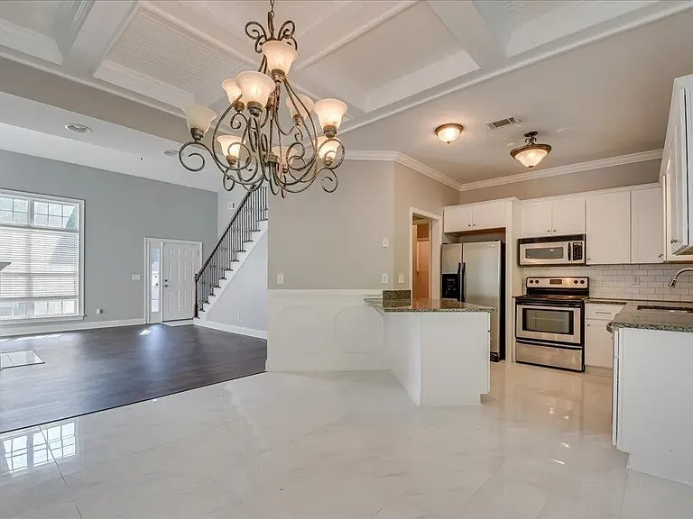 Full View of living room, dining room, and kitchen