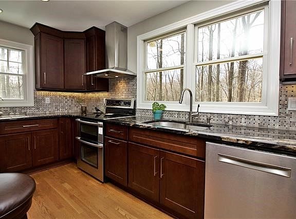 Natural sunlight fill this kitchen.  Generous work space and cabinets.