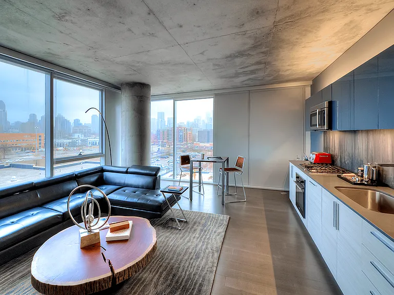 Model apartment kitchen and living area
