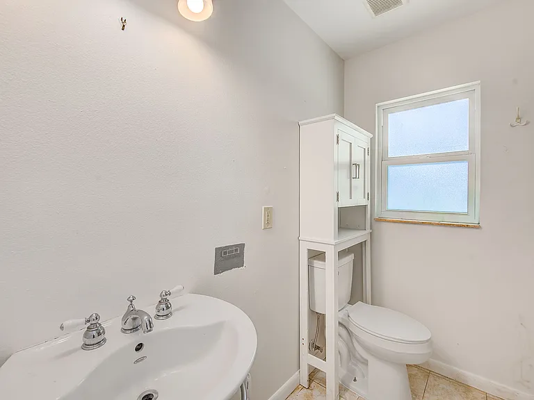 303 Saint Augustine Ave — Photo 27