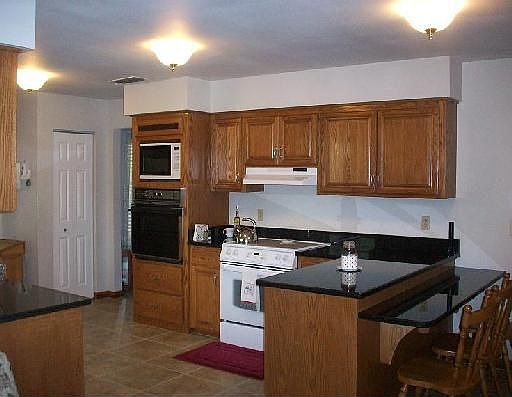 Another view kitchen/ marble tops and tile floors