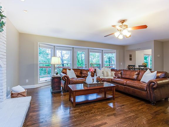 Family gathers here in the great room with wall of bay windows across the back.  Plus lighted gas fireplace