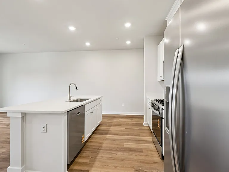 Central quartz island ideal for gathering and entertaining