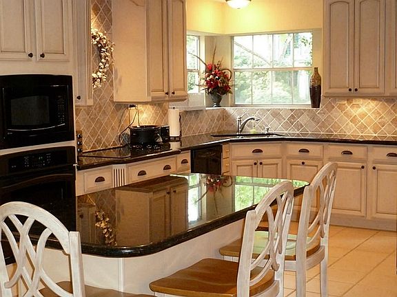 Beautiful kitchen with KraftMaid cabinets and under counter lighting