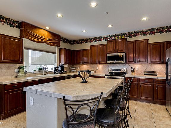 5th image of 8837 W Potter Dr