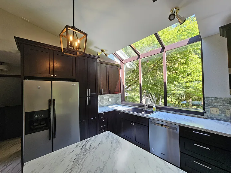 Tall custom window design to maximize natural light.
