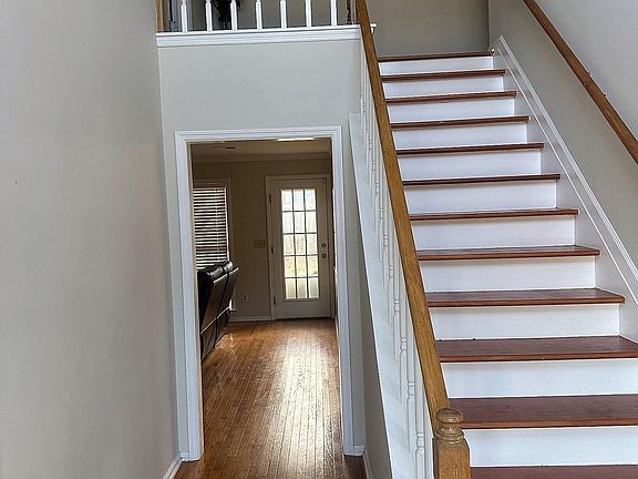 This is the 1st of 2 stairways leading from the main entrance to the owner's bedroom and second floor.