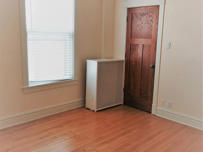 Bedroom 2 with two large windows and walk in closet