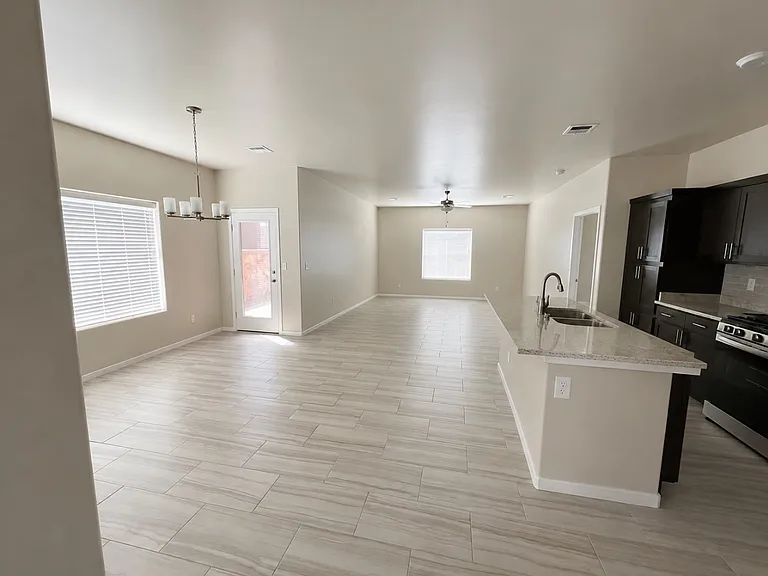 Enjoy the open floor plan with the living and dining room open to the island kitchen.