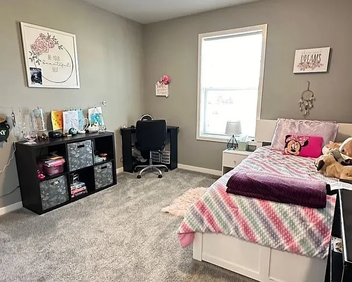 Step into a cozy and stylish bedroom at LS Capital Group, featuring elegant decor and ample natural light. This inviting space is perfect for relaxation or productivity. Don't miss your chance to make this your new home; schedule a tour today!