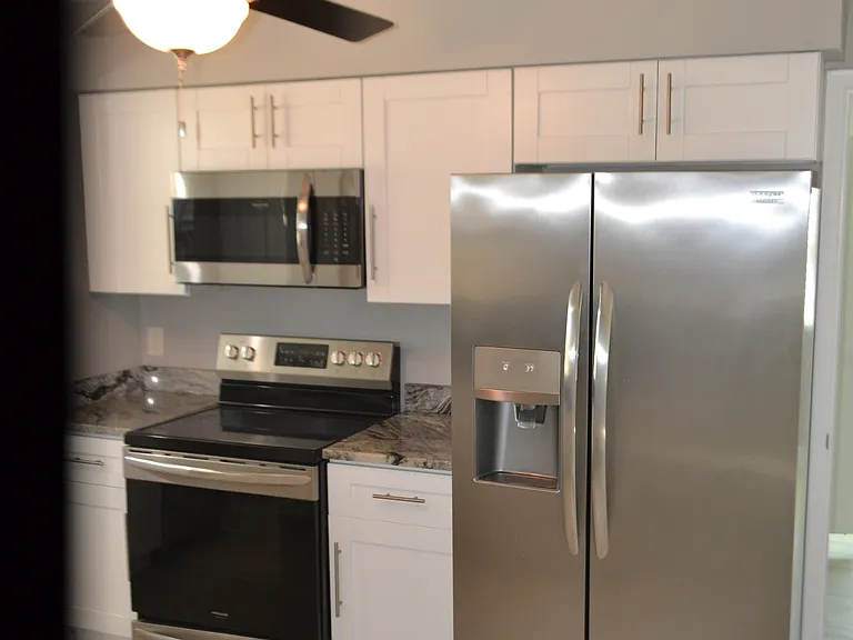 6204 W Knights Griffin Rd — Photo 5