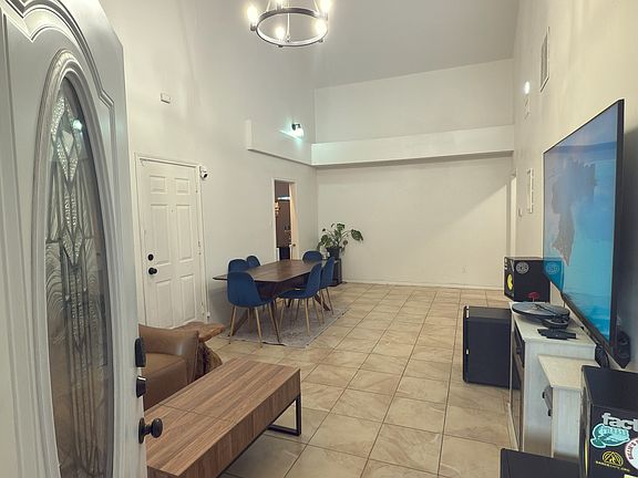 Beautiful living room with tall ceilings as soon as you walk into the home