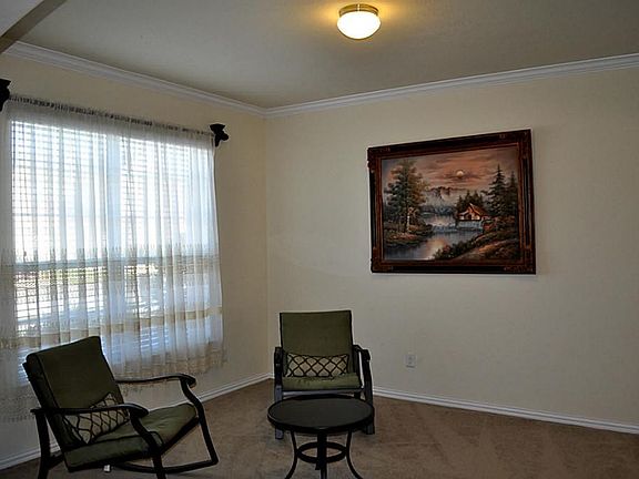 Formal Living w/upgraded crown molding.