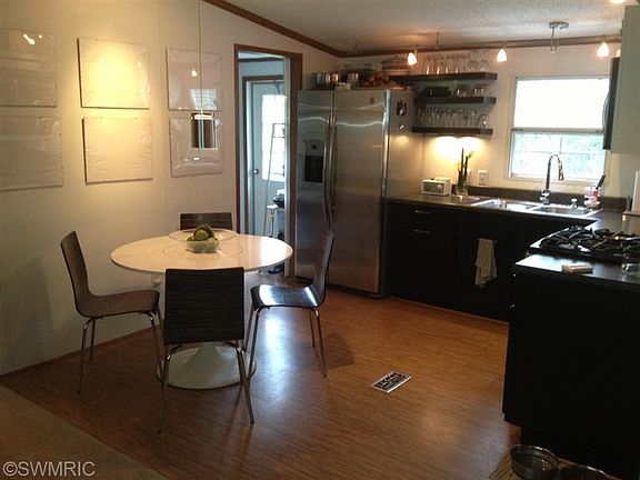 2nd image of 10999 Grand River Dr SE