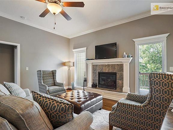 The beautiful gas fireplace is the focal point of this living space