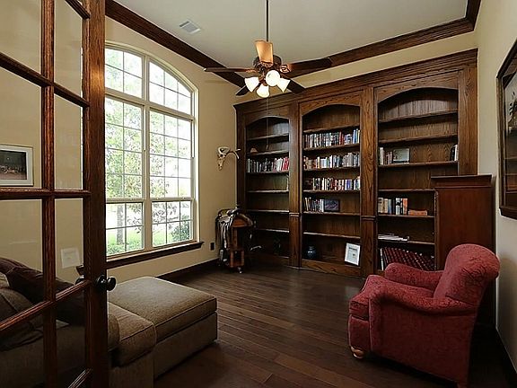 French doors lead to this beautiful study located next to the front door. Study has great built in s