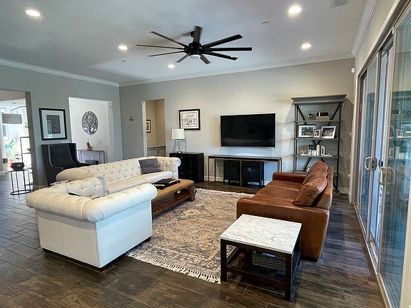 Living space with sliders to back yard