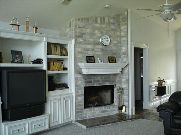 Fireplace with built in entertainment cabinets!