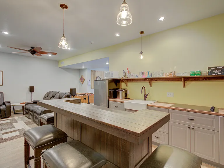Cooktop included in the kitchen and bar area.