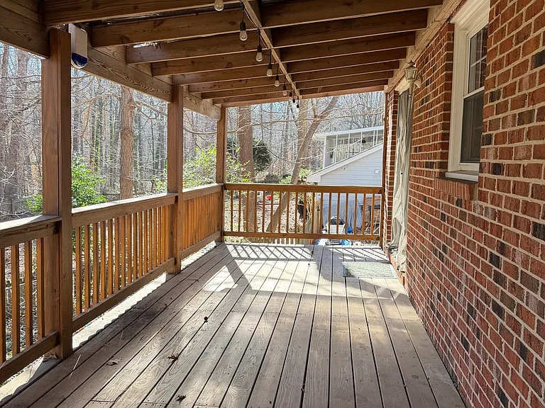 Rear deck - accessible from Family room and Dining room / Home office.