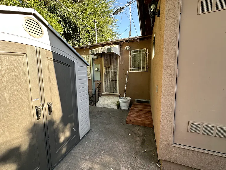 Back area storage shed and back door