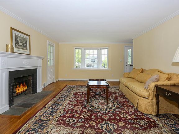 Large living room with working fireplace