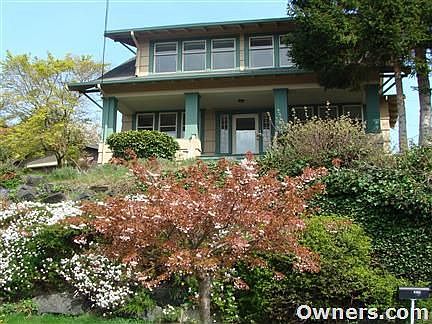 Spacious front porch and windows galore