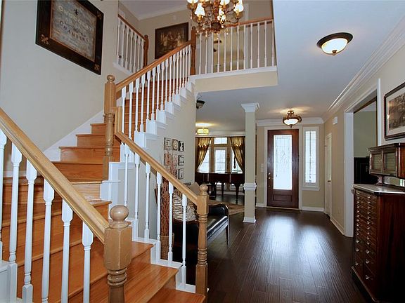 Step inside this immaculate home to find extensive crown molding, chair rail, neutral colors, updated flooring and a fabulous floor plan!