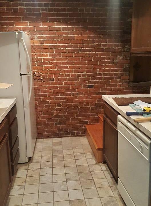 Galley Kitchen w/ full size stove & fridge
