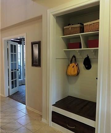 Awesome wet closet offers great storage and organization.