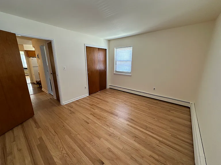 Bedroom, with door open