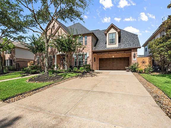 Home features a 2.5 car tandem garage and the roof was replaced in 2015.