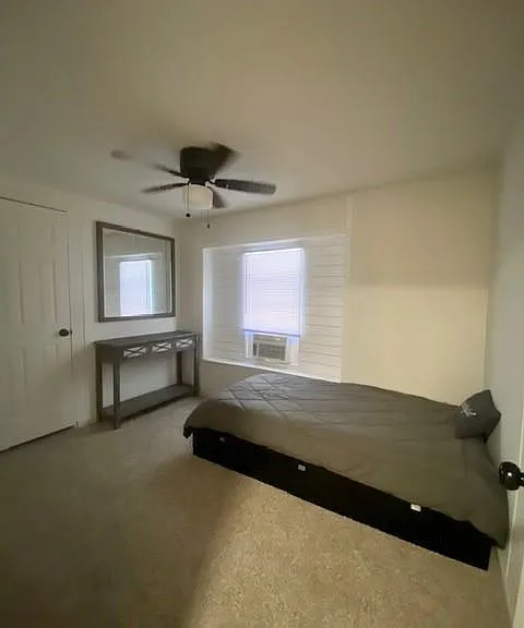 Bedroom 2 - Studio. This room is versiatile and can be used as a second bedroom, furnished with a twin bed if desired or can be converted into a home workplace for the hybrid worker on extended assingments.
