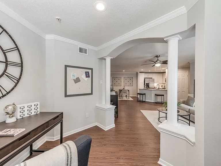 Sustainable wood plank-style flooring throughout