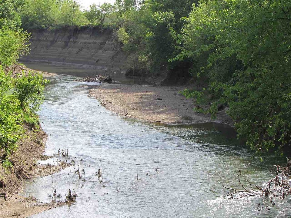 good flowing stream that yields large catfish.