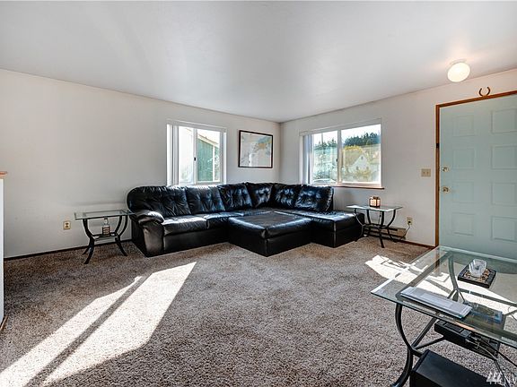Loads of natural light fill the living room.